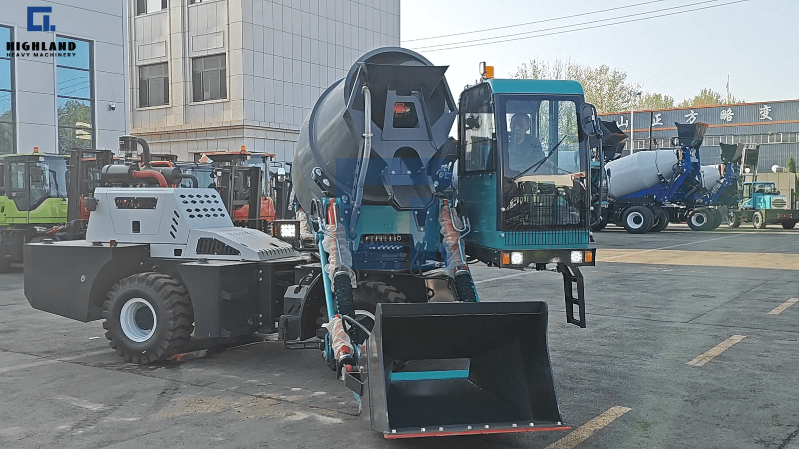 HIGHLAND HEAVY MACHINERY 2m³ self loading concrete mixer truck front view, showing the lowered loading bucket, enclosed operator cabin, and sturdy chassis, parked in a factory yard for buyer parameter evaluation.