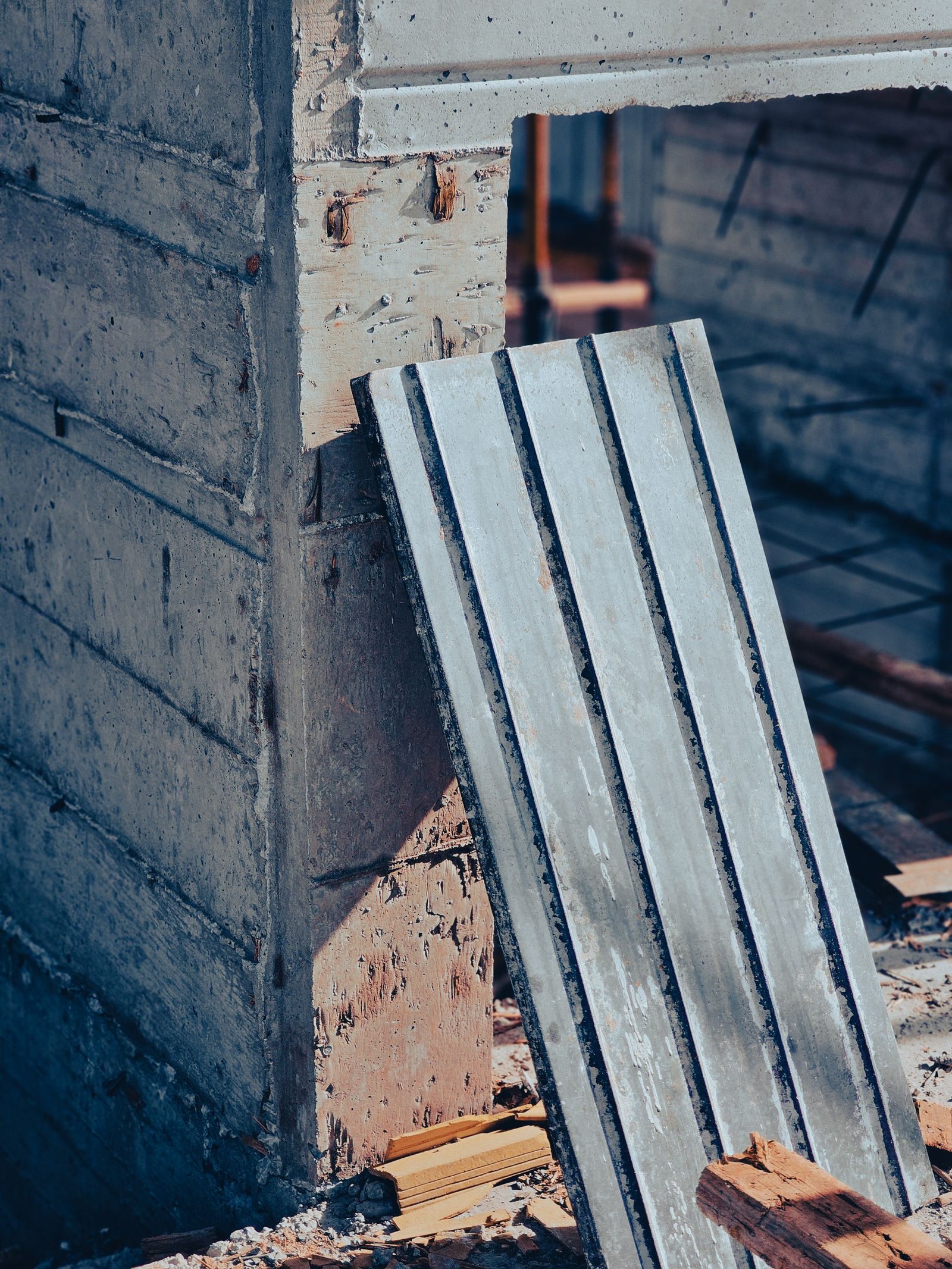 HIGHLAND HEAVY MACHINERY construction site detail showing steel concrete formwork and support structures prepared for foundation pouring, demonstrating the high-quality structural preparation required for durable infrastructure projects.