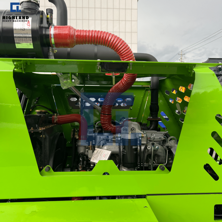 HIGHLAND HEAVY MACHINERY - Self Loading Concrete Mixer Truck Engine Compartment | Open Hood, Red Intake Hose & Accessible Service Layout