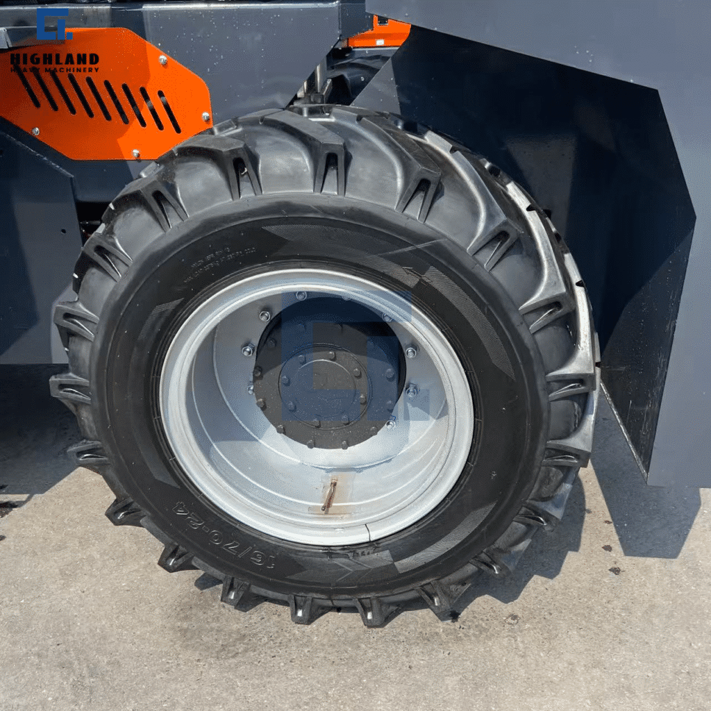 HIGHLAND HEAVY MACHINERY - Off-Road Forklift Tire & Steel Rim Detail | Deep Tread Design for Ultimate Traction