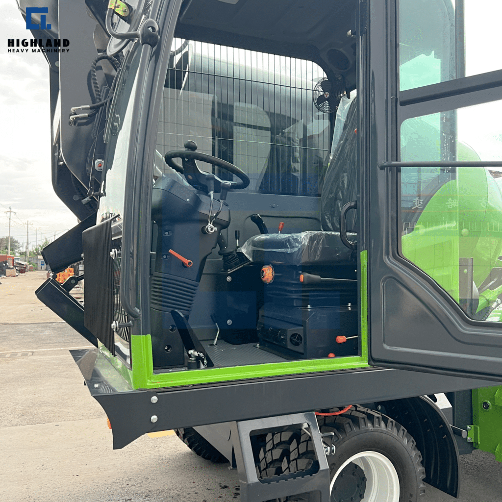 HIGHLAND HEAVY MACHINERY - Self Loading Concrete Mixer Truck Open Cabin Door | Ergonomic Controls, Dashboard & Brand New Seat